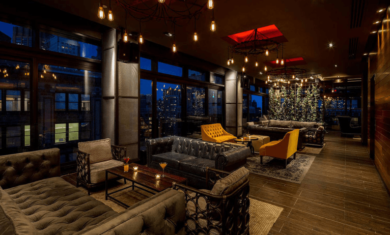 Cozy winter lounge at Royalton Park Avenue with spectacular NoMad views